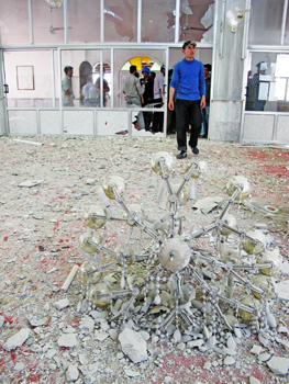 a2.libya.syria.homs.damage.story