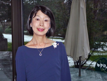 Japanese Interpreter’s Charm Not Lost in Translation