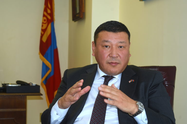 Vast Mongolia, squeezed between China and Russia, treads carefully