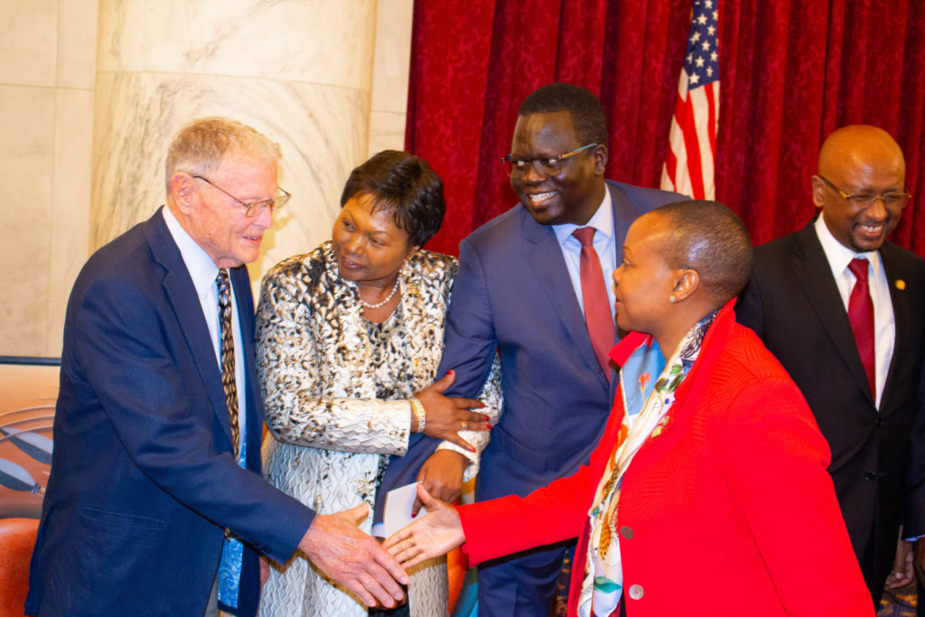 Ambassador Mathilde Mukantabana, second from left, introduces Senator Inhofe to African diplomats.